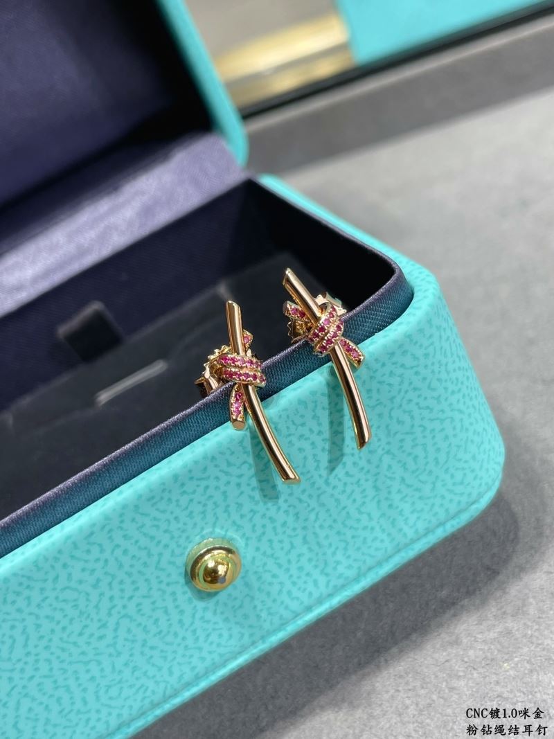 T*f*ny earrings